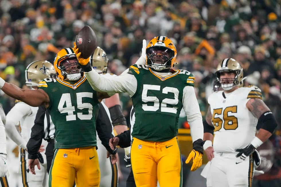 Green Bay Packers defensive end Rashan Gary (52) celebrates a fumble recovery during the first...