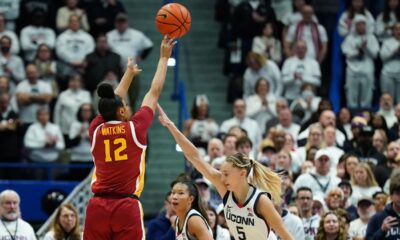 JuJu Watkins stars as USC holds off Paige Bueckers, UConn