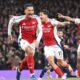 Man United show progress in loss, Arsenal chase Liverpool