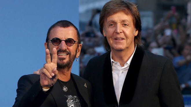 Paul McCartney reunites with Ringo Starr at London concert