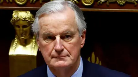 Reuters Michel Barnier with a grave expression