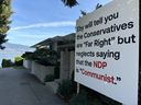 A sign outside Vancouver billionaire Chip Wilson's home claims the B.C. NDP are Communists as voters prepare for the Oct. 19, 2024, provincial election.