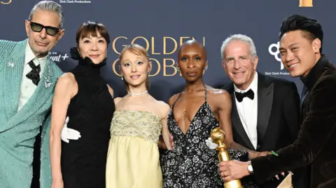 Getty Images Jeff Goldblum, Michelle Yeoh, Ariana Grande, Cynthia Erivo, Marc E. Platt, Jon M. Chu