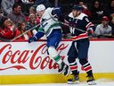 Alex Ovechkin plays as hard as he shoots. He drilled former Canucks forward Curtis Lazar into the boards during a 2022 meeting in Washington.