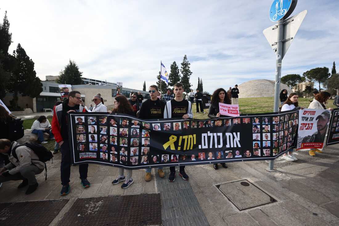 Relatives and supporters of hostages held in the Gaza Strip rally outside Israeli Prime Minister's office in Jerusalem, on Jan. 14, 2025.