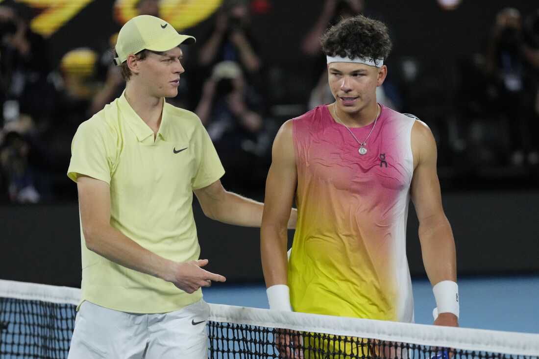 Jannik Sinner, left, of Italy is congratulated by Ben Shelton of the U.S., following their semifinal match at the Australian Open tennis championship in Melbourne, Australia, Friday, Jan. 24, 2025.