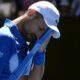 Novak Djokovic retires injured from Australian Open semifinal, as some fans boo : NPR