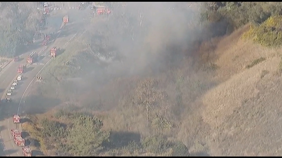 Brush fire, smoke, flames, evacuations, map in La Jolla