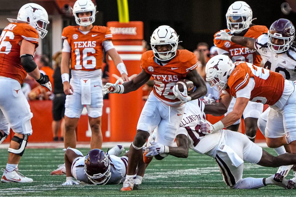 Texas running back Quintrevion Wisner (26) runs the ball during the team's game against Mississippi State at Darrell K Royal-Texas Memorial Stadium in Austin Saturday, Sept. 28, 2024.