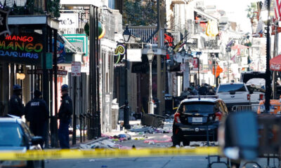 Debris is left along Bourbon Street after a pickup truck was driven into a large crowd in the French Quarter of New Orleans