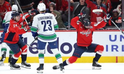 Dubois scores twice, lifts Capitals past Canucks in OT