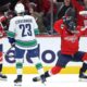 Dubois scores twice, lifts Capitals past Canucks in OT