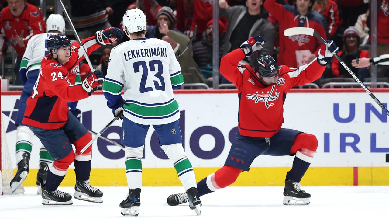 Dubois scores twice, lifts Capitals past Canucks in OT